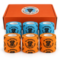 Six rolls of Dr. Brahmsy's Dogtastic elastic bandages, three blue and three orange, in front of the orange carton