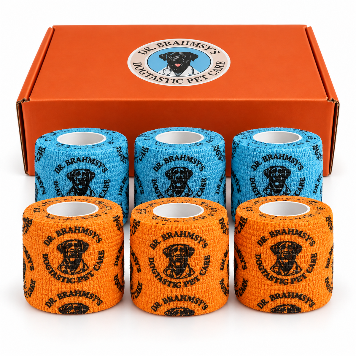 Six rolls of Dr. Brahmsy's Dogtastic elastic bandages, three blue and three orange, in front of the orange carton